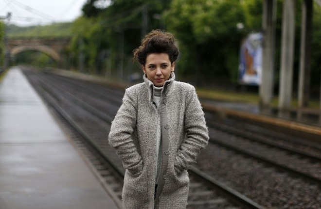 Susanna Dimitri waits for a train at Vaux-sur-Seine train station